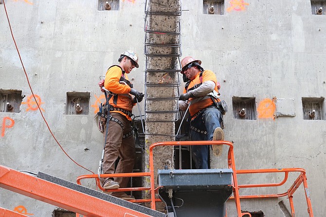 Workers reinforcing the historic arches. (photo: Gregory's San Diego)