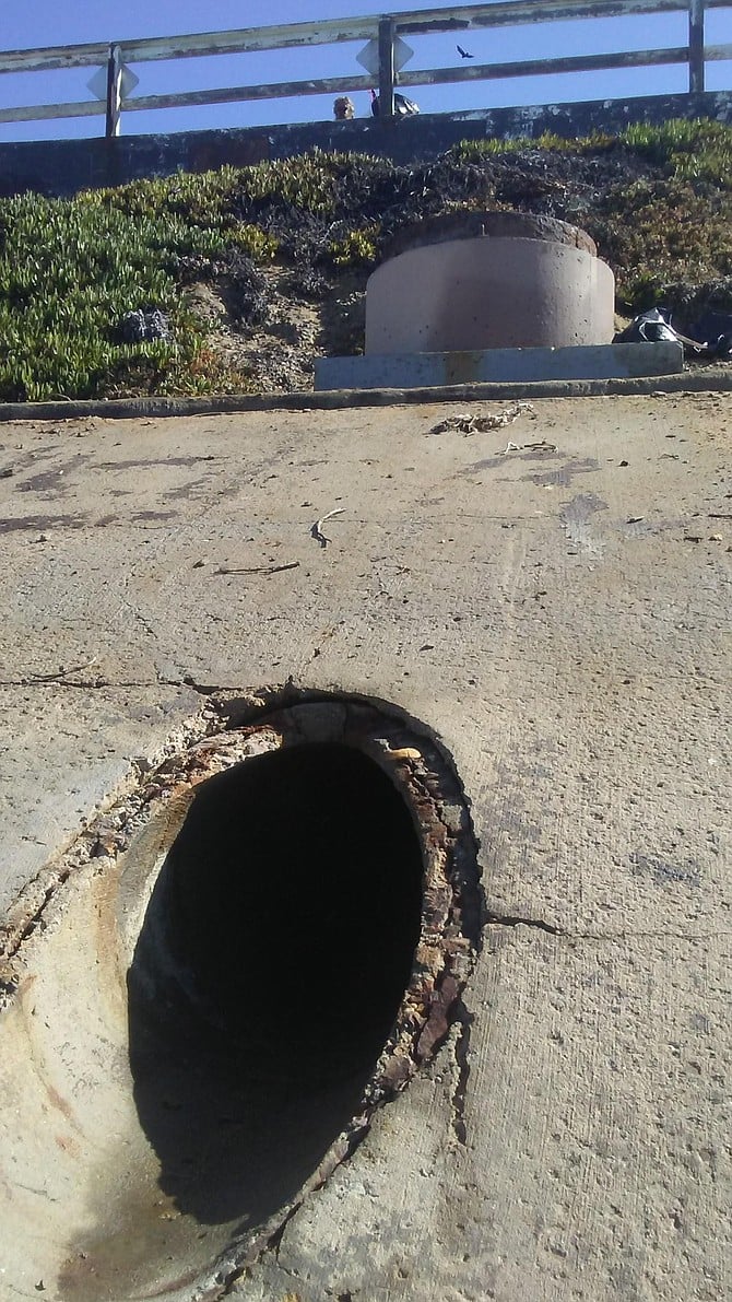 Neighbors reported having seen people crawl out of the drain outlet.
