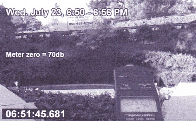 Noise-meter photo taken from resident's window reads 74 decibels 