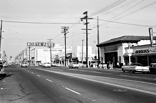 JC Penney in the distance, beyond the North Park sign in 1964 (Sim Bruce Richards Family)