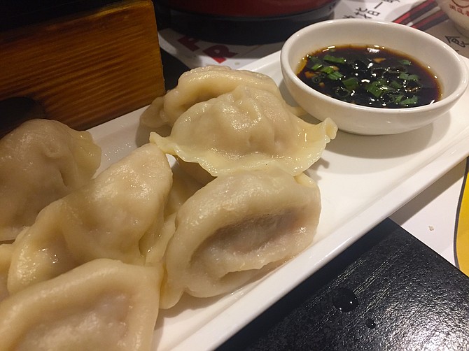 Perfect Pork Dumplings with a chive-soy dipping sauce