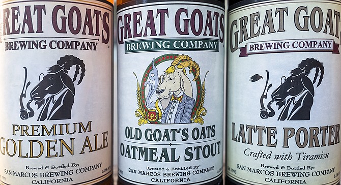 The pipe-smoking goat icon of Great Goats Brewing, dressing up San Marcos Brewery beers