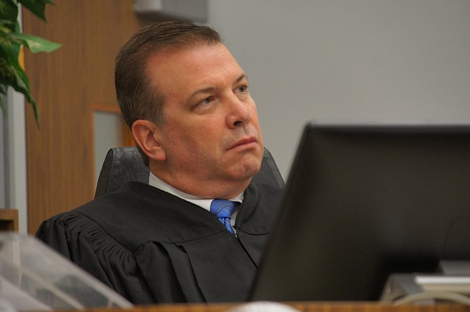 Judge Blaine Bowman listening to victims' impact statements