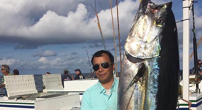 Excel angler Stephen Zing with a 184-pound yellowfin tuna. 