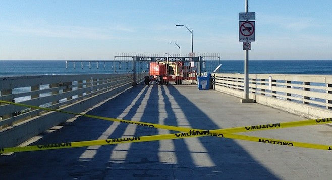 The pier has been closed for a day. City workers say the job will be completed tomorrow.