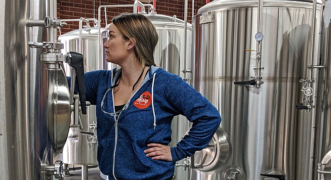 Former San Diego brewer Carli Smith gets familiar with her new brewhouse in Charlotte, NC.