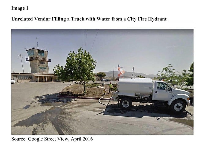 Photo of "unrelated vendor" filling water truck from city hydrant