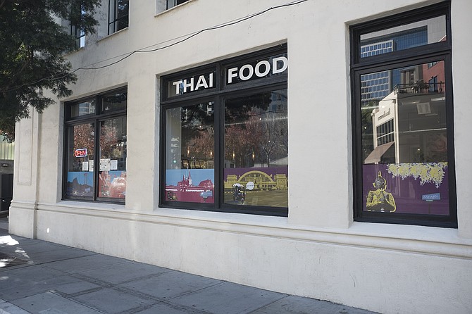 A nondescript exterior for a downtown Thai restaurant, pronounced Ah-harn.