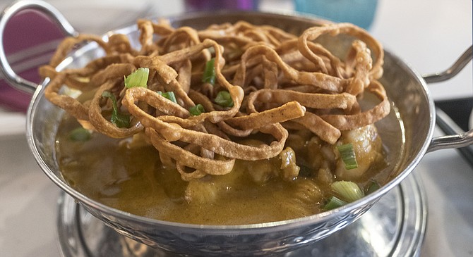 Khao soi: crispy noodles add to the fun of a soupy noodle curry dish