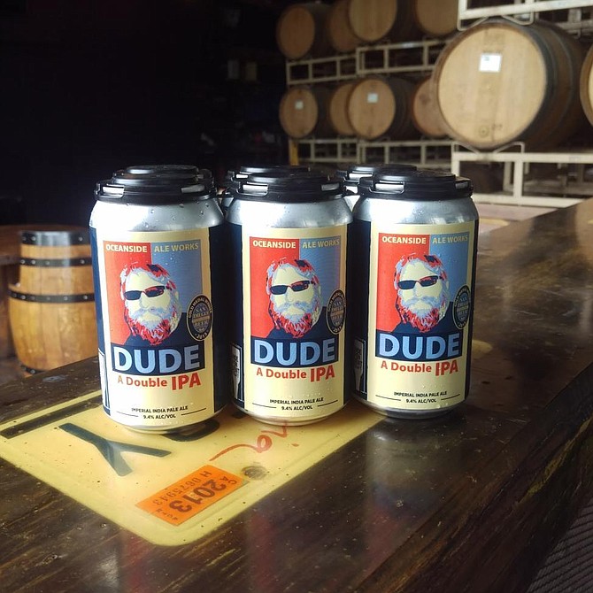 A can release of Dude double IPA, depicting Oceanside Ale Works cofounder Mark Purciel on the label.