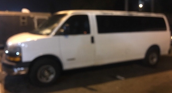 The van allegedly used by the "magazine salesmen," outside the Heritage Inn