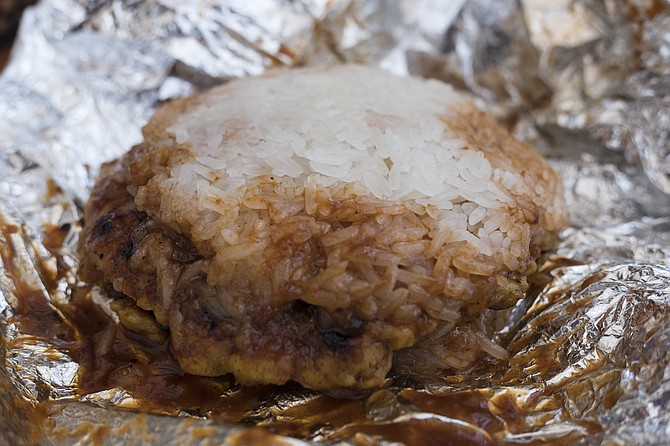 The sauce seeps into the rice, adding to the sloppy burger tradition