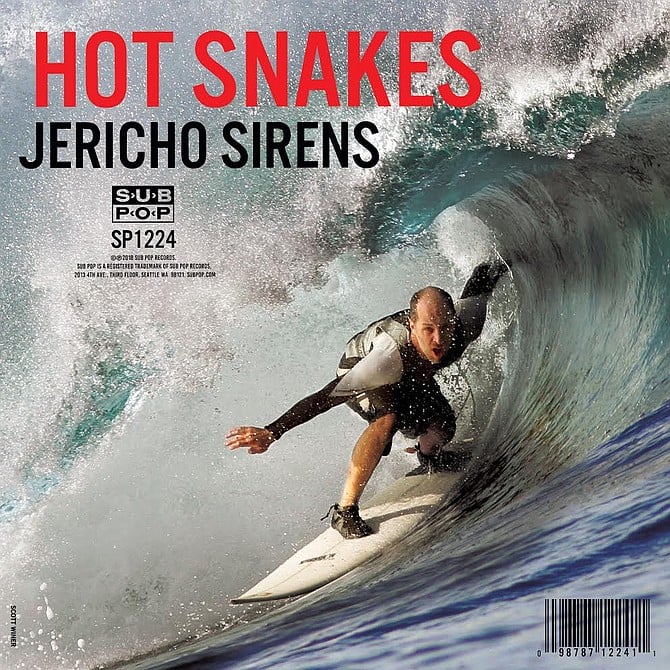 Bassist Gar Wood shows off his tube-riding style on the new Hot Snakes record.
