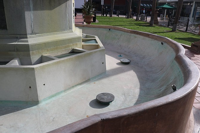 Vandalism shut down recently restored historic fountain. 