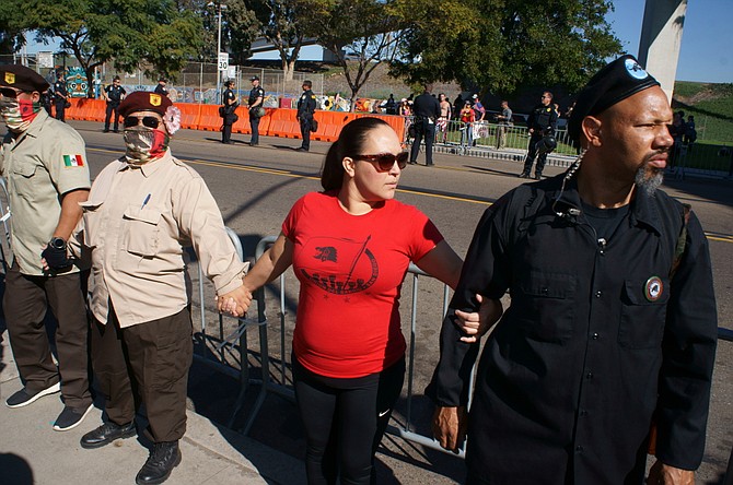Counter-protesters formed a barrier at Chicano Park.