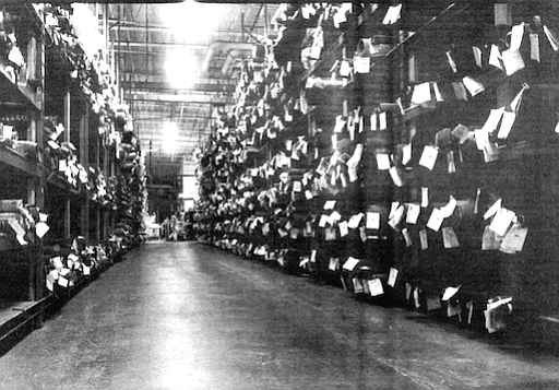 Fabric warehouse. Where they had once worked almost exclusively with wool, they now had to cope with  cashmere, Ultrasuede, and hard-to-handle, filmy silks. 