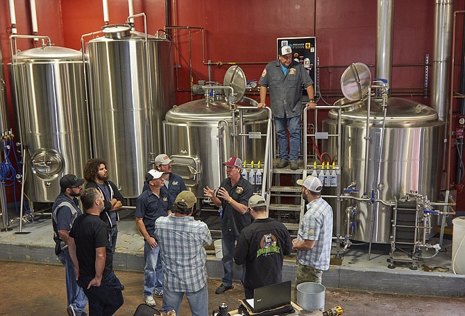 QUAFF members and Indian Joe brewers collaborate on a fundraising beer.