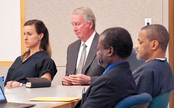 Diana Lovejoy (Mulvihill’s estranged wife) and McDavid sit with their attorneys during trial. Lovejoy did not testify, McDavid did — with disastrous consequences.