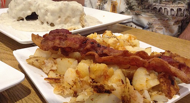 Willy's half-order of biscuits and gravy plus home fries and bacon for $6.95
