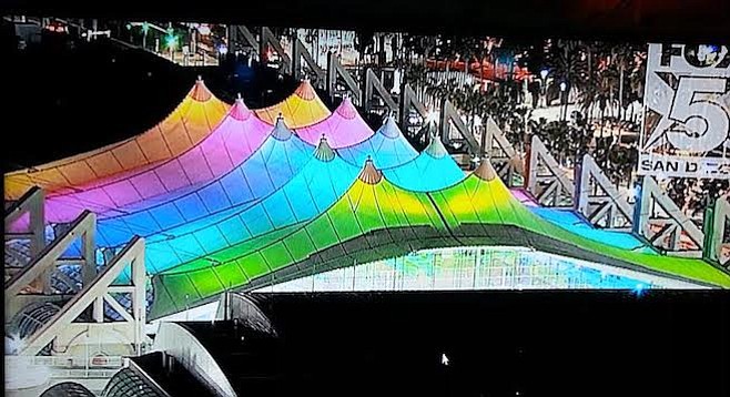 With a Fox 5 drone overhead to capture the scene, the sail scrolled through several solid colors while triumphant-sounding music played
