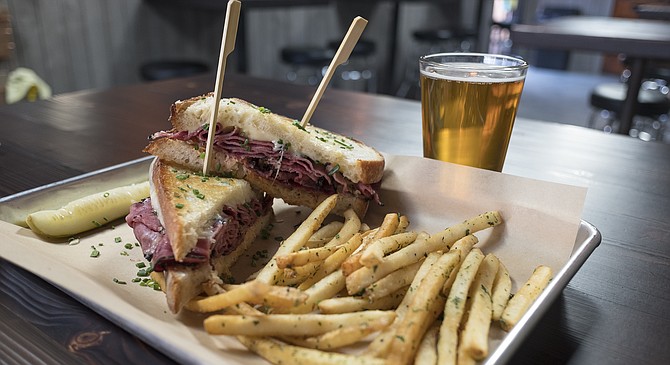 A Reuben for $9, with beer and fries for $5 more