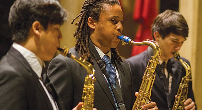 Teenaged saxophonists Tiger Diep (left) and Alvin Paige (center) are two of the young jazz musicians in the Young Lions program.