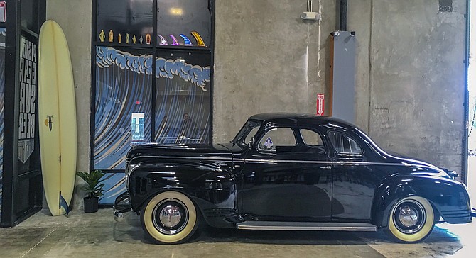 Vintage cars and surfboards have a place in the Beach Grease tasting room
