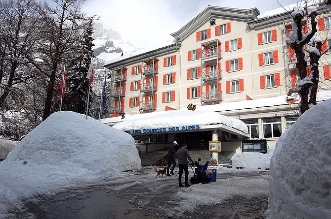 Clearing the snow at the five star Les Sources des Alpes Hotel & Spa in Leukerbad.