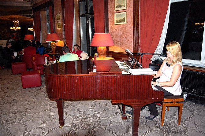 The piano player in the lobby bar of the five star Les Sources des Alpes Hotel & Spa in Leukerbad.