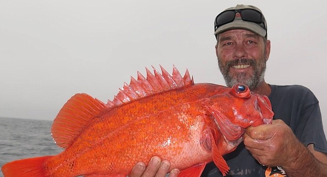 Juan Cook with vermilion rockfish caught from pinnacle rock off Baja coast