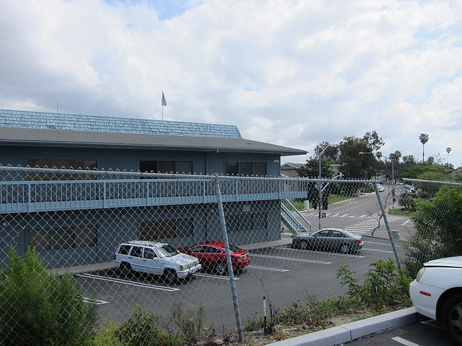 A view from the shopping center surrounding the proposed homeless housing. 