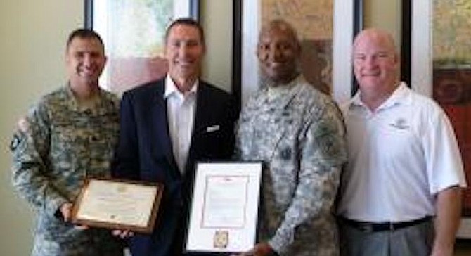 Clark and military friends. Thomas Hansbarger, Clark, Brigadier General Henry Huntley, executive director of San Diego Army Advisory Council Jim Bernet