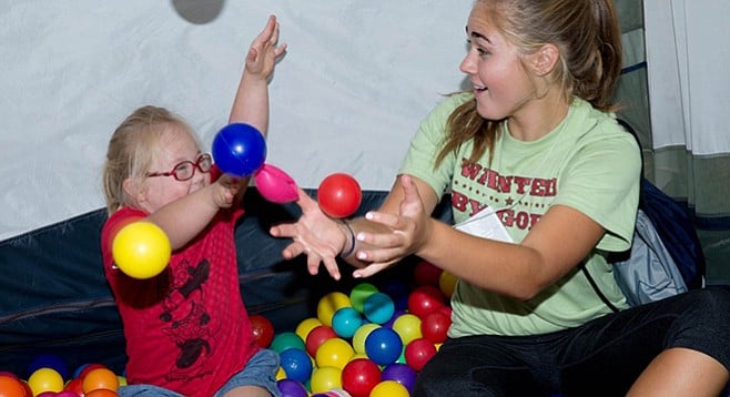  The camp pairs “Special Needs Buddies” to each family.