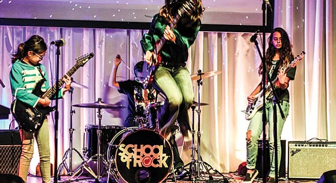 School of Rock: Playing in a band encourages practice. 