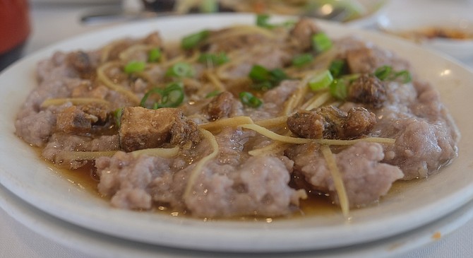 Ignore the odor and dig in to this steamed pork and salted fish dish.