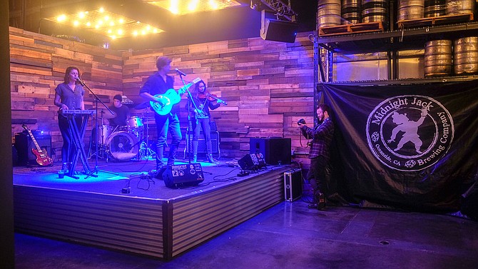 J. Hoftsee and band perform at Midnight Jack Brewing
