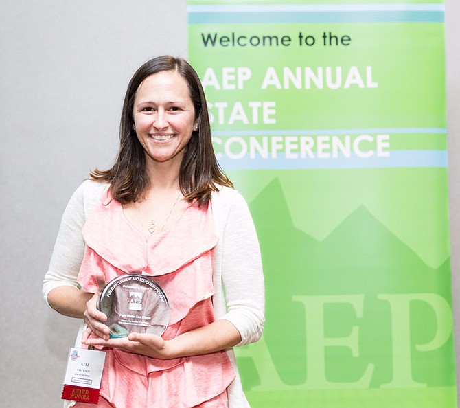 Pure Water has garnered awards such as this one for public outreach from American Planning Association - the "Oscars" of environmental planning awards. Pure Water project manager Keli Bolo in photo. 