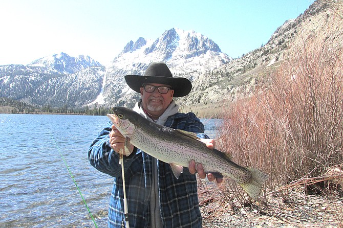 Ken Harrison with three-pound, one-ounce rainbow