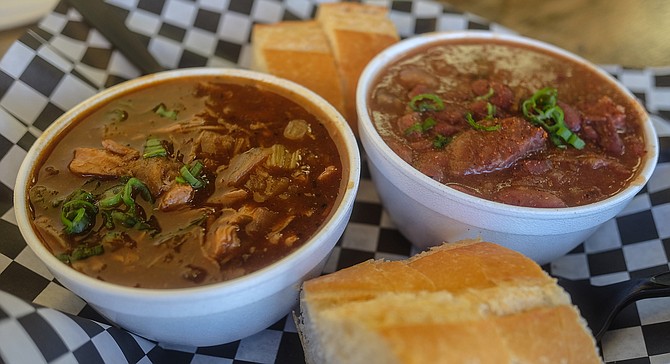 Gumbo on the left, red beans and rice with smoked sausage on the right.