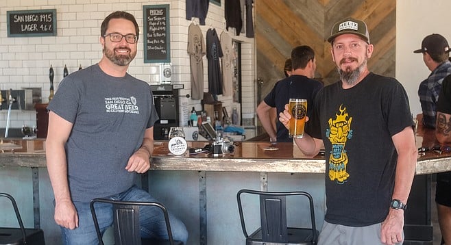 Bill Vanderburgh and Rob Strobel drink beer at Latchkey Brewing Company.