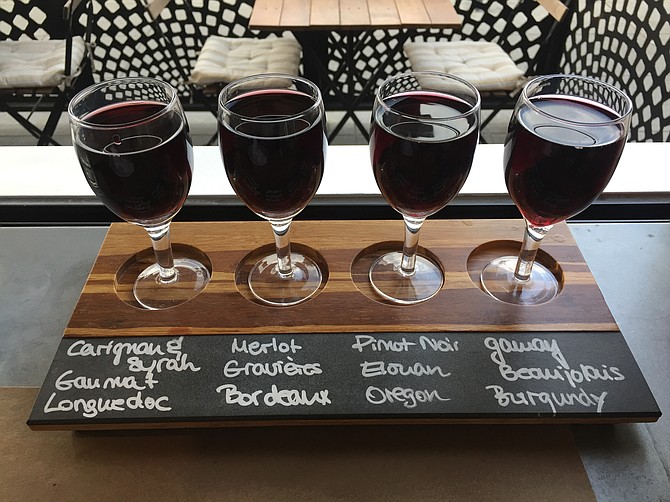 Red wine flight, with generous pours