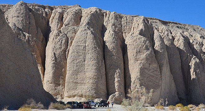 Large palisades mark the entrance to the slot canyon.
