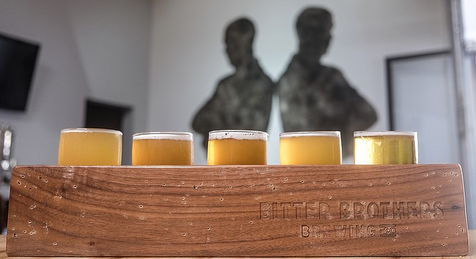 A flight at Bitter Brothers, starting with a pilsner, ending with a sour.