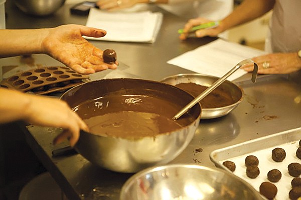 Dallmann Chocolates. Learn how to tell good chocolate from bad, how to infuse chocolate, and rolling and piping truffles.
