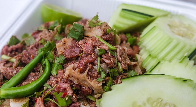 The more authentic Laotian laab, with raw beef, beef bile, and honeycomb tripe.