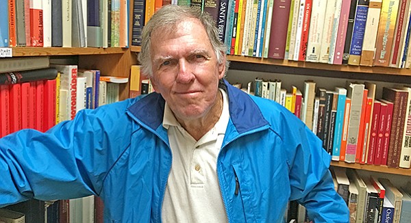 John Drehner looked for a few tomes to add to his 12,000-book collection.