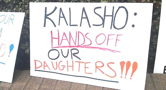 Sign referring to the beauty pageant Kalasho was involved with