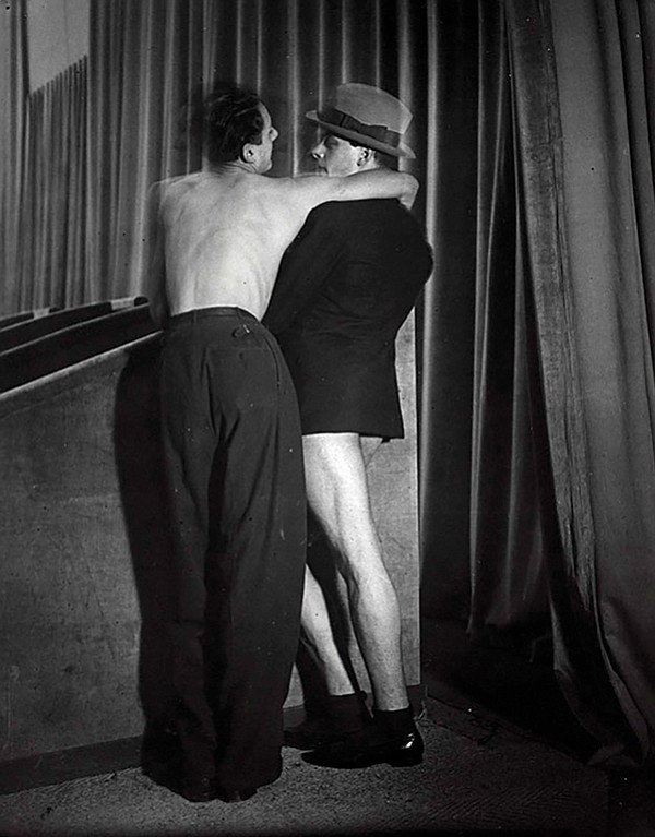 Brassaï, Young couple wearing a two-in-one suit at the Bal de la Montagne Sainte-Genevieve, c. 1931.