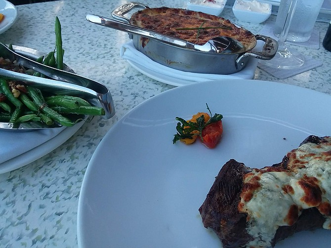 This $56 steak combined with the entire dining experience was worth every penny- of my friend's money.
