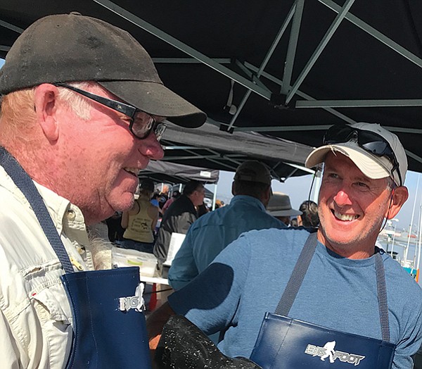 Randy Hupp, left, and fellow fisherman